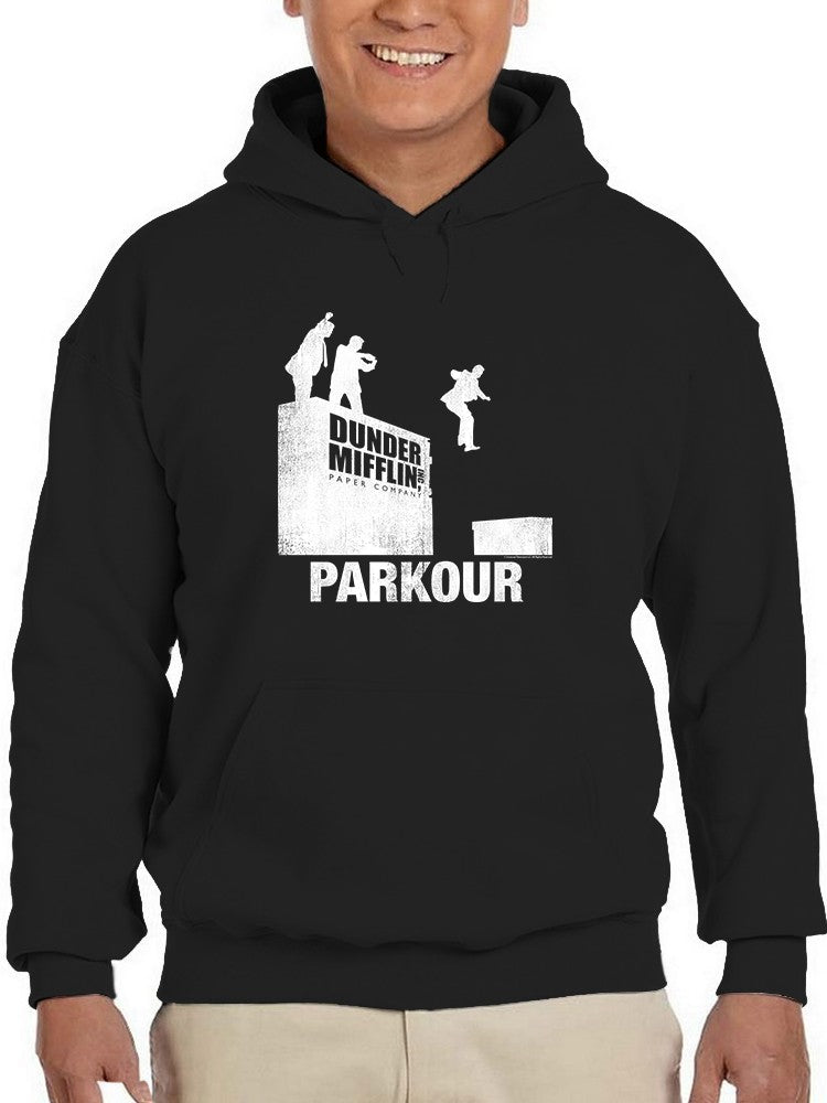 a person wearing a black hoodie