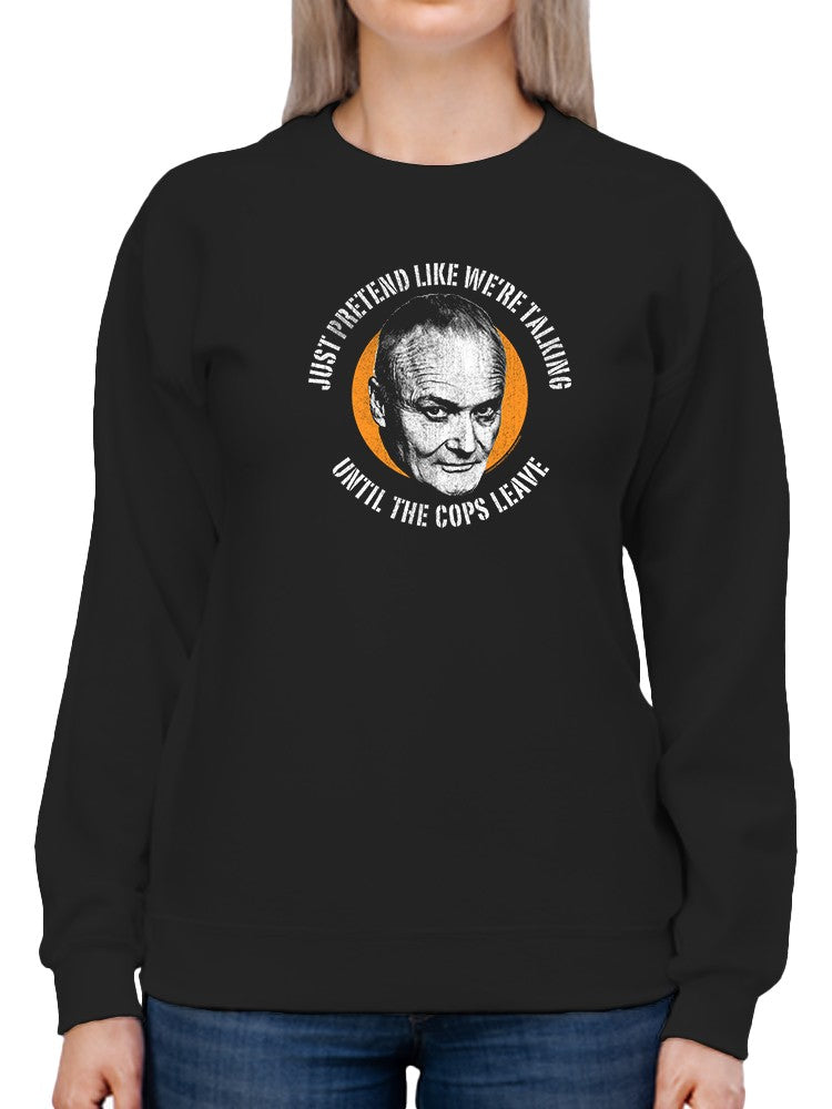 a person wearing a black sweatshirt