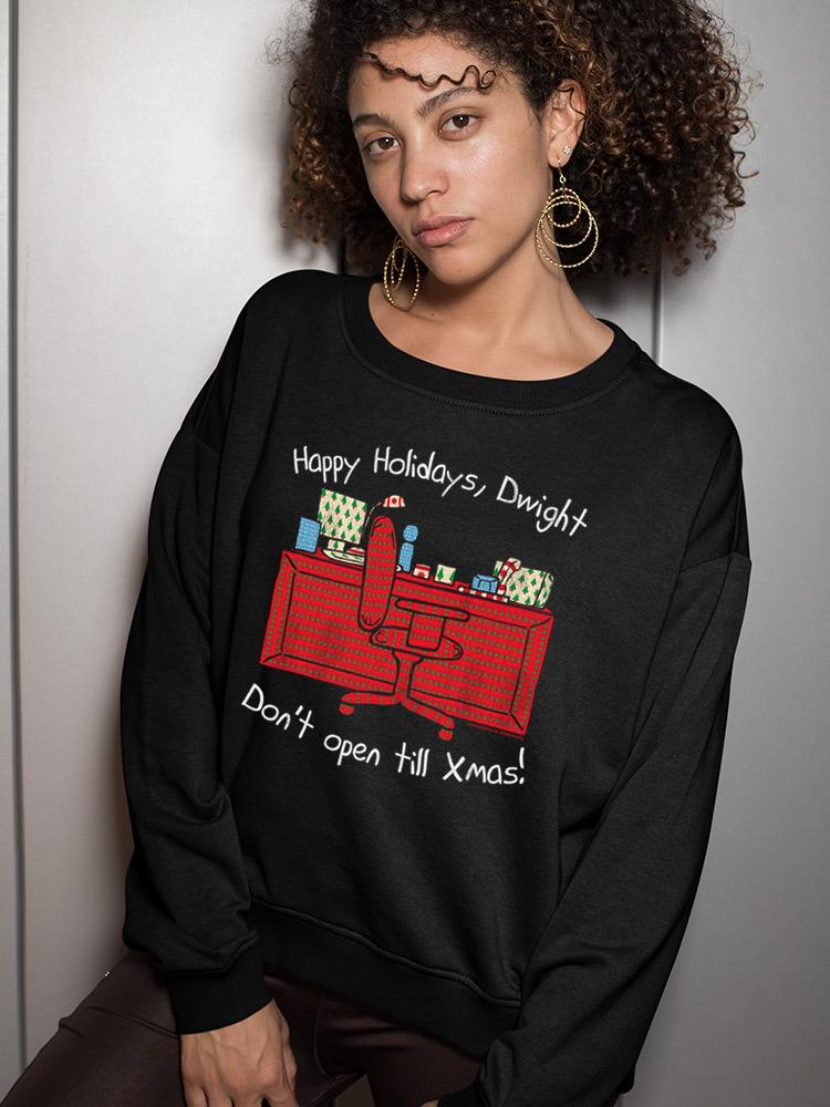 a woman wearing a black sweater