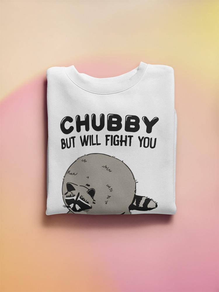 a white shirt with a raccoon on it