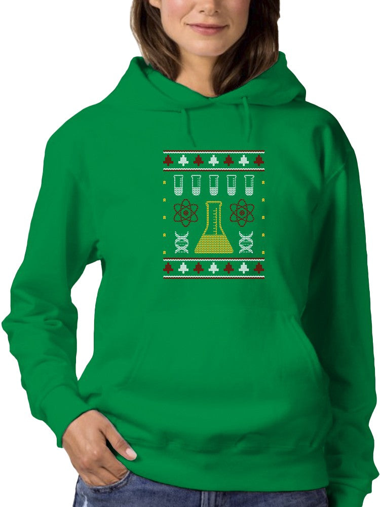 a woman wearing a green sweatshirt