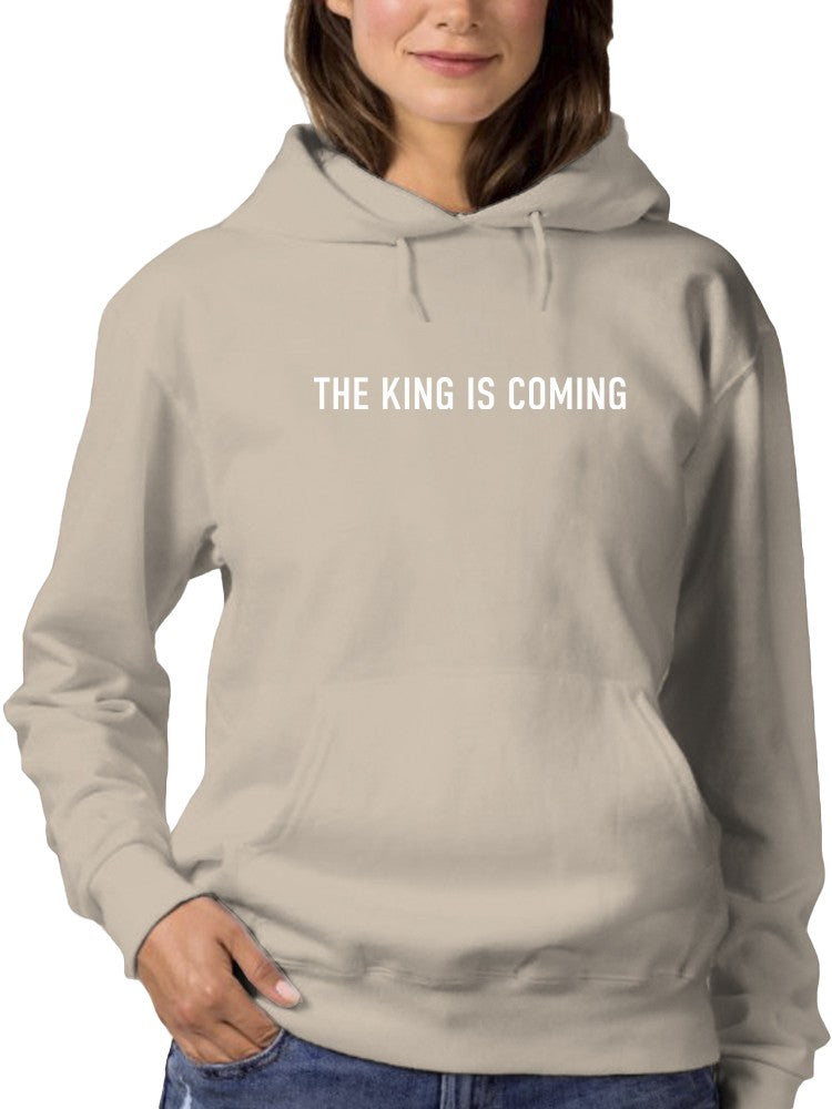 a woman wearing a hoodie