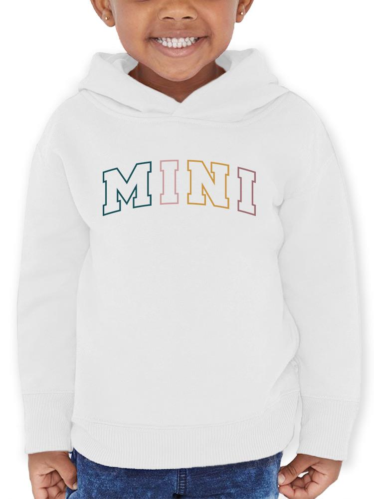 a child wearing a white hoodie