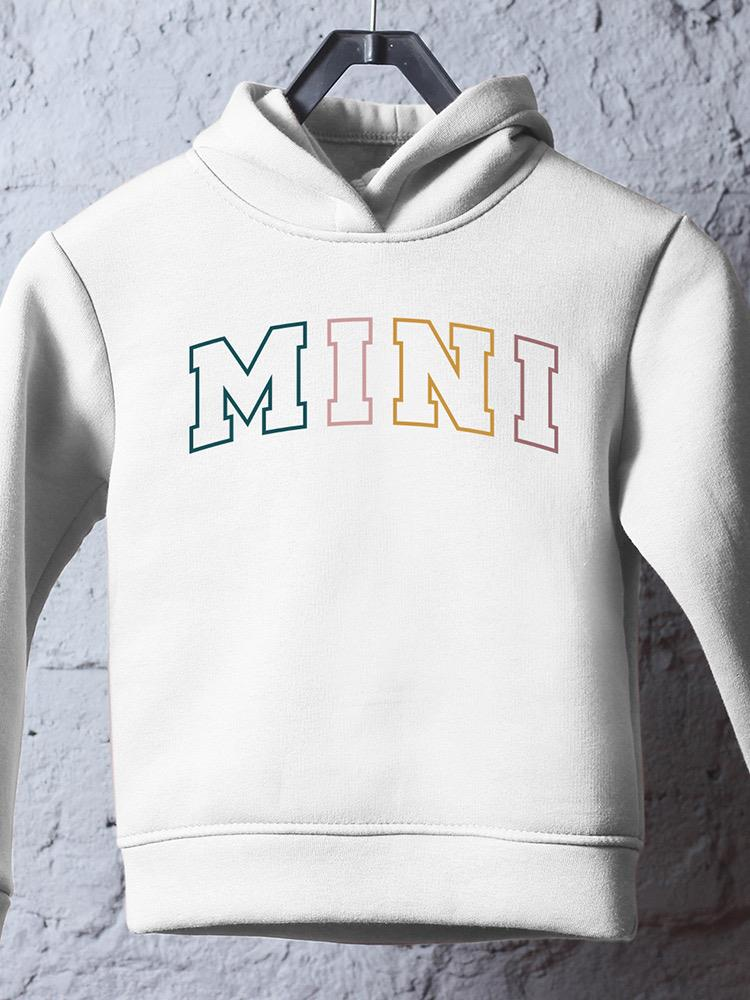 a white sweatshirt with colorful letters on it