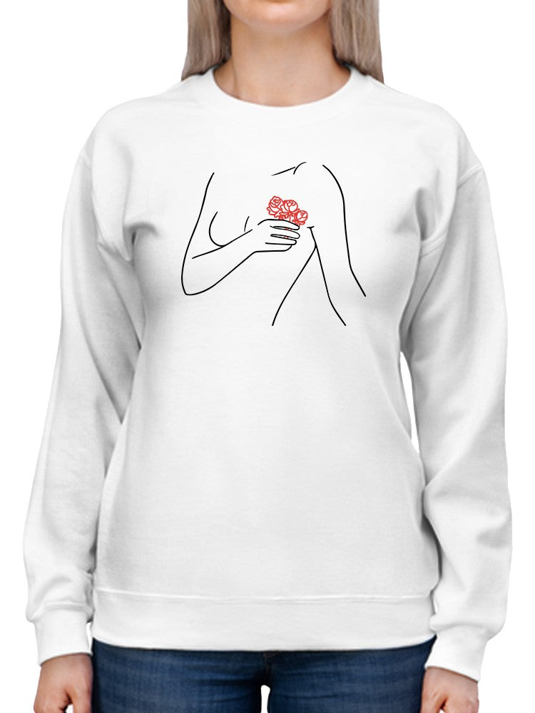 a woman wearing a white sweatshirt