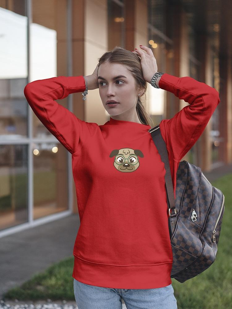 a woman in a red sweatshirt with her hands on her head