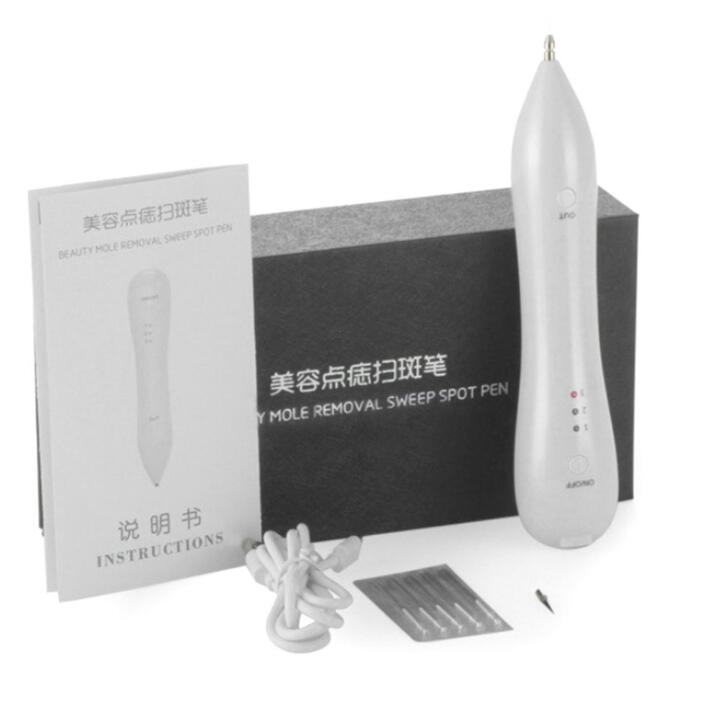 a white device with a box and instructions