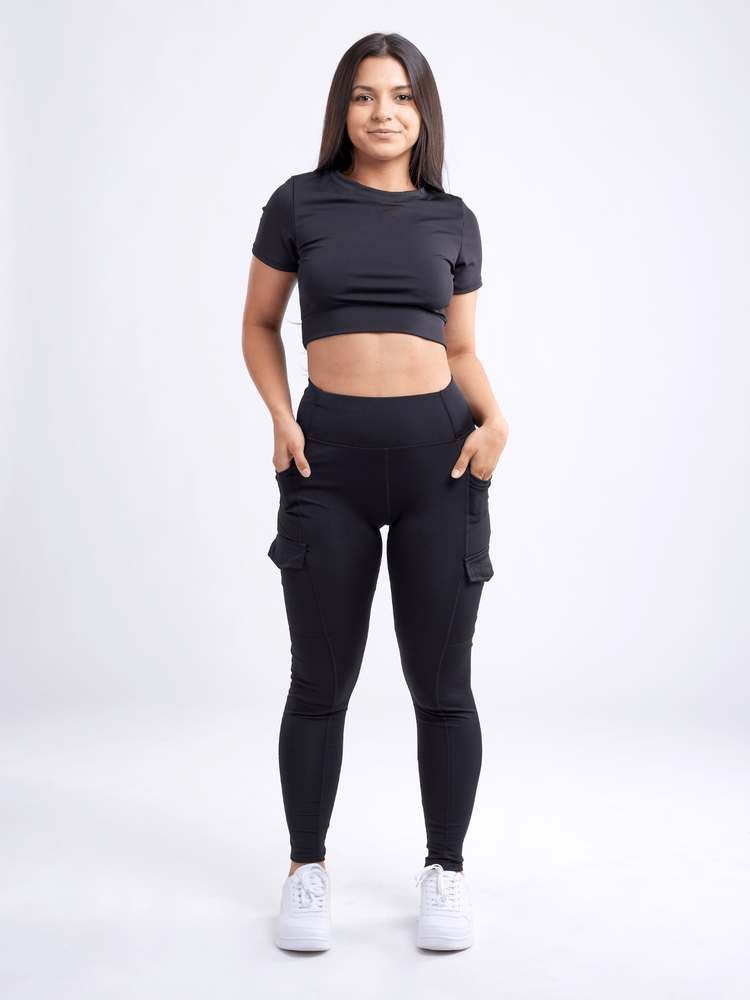 a woman in black outfit