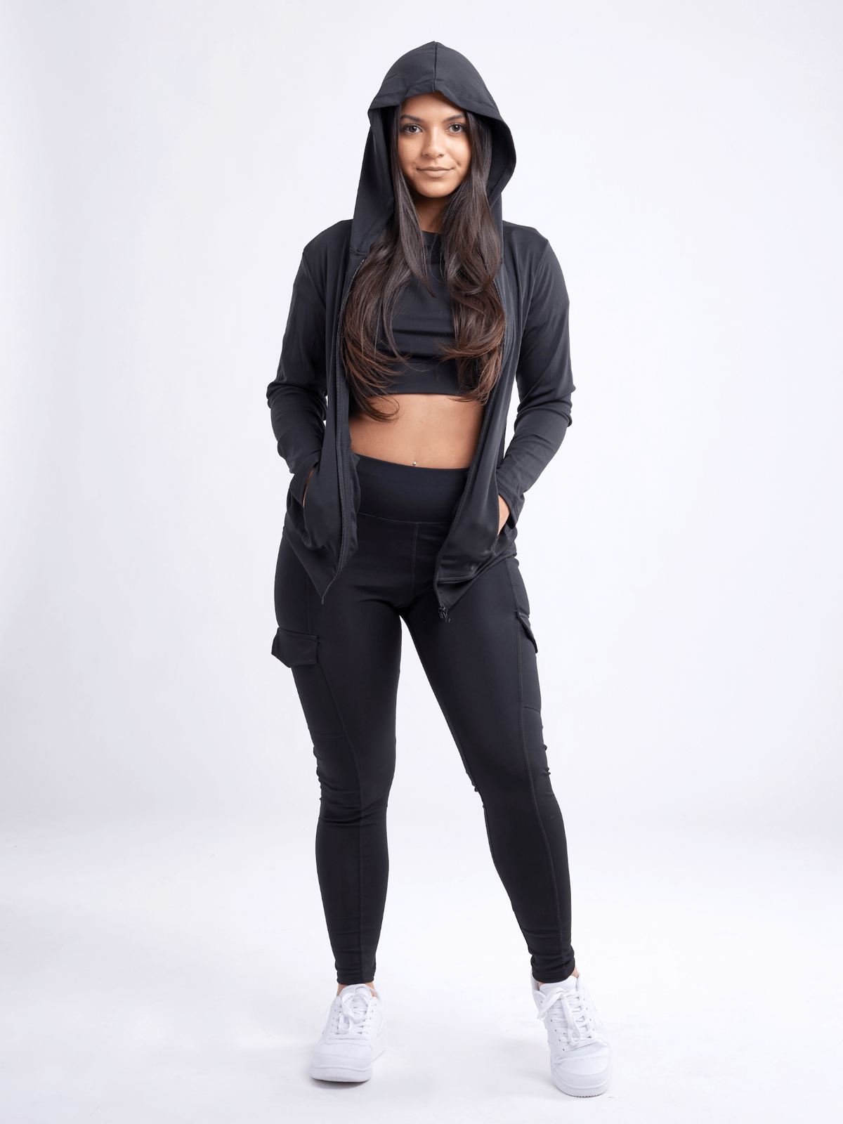 a woman in a black hoodie