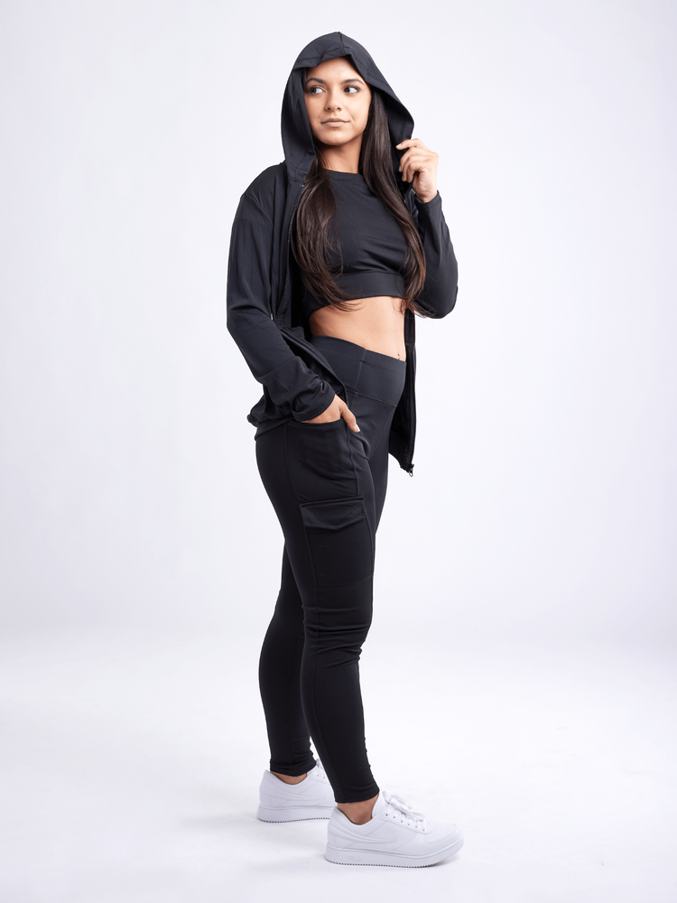 a woman in a black hoodie