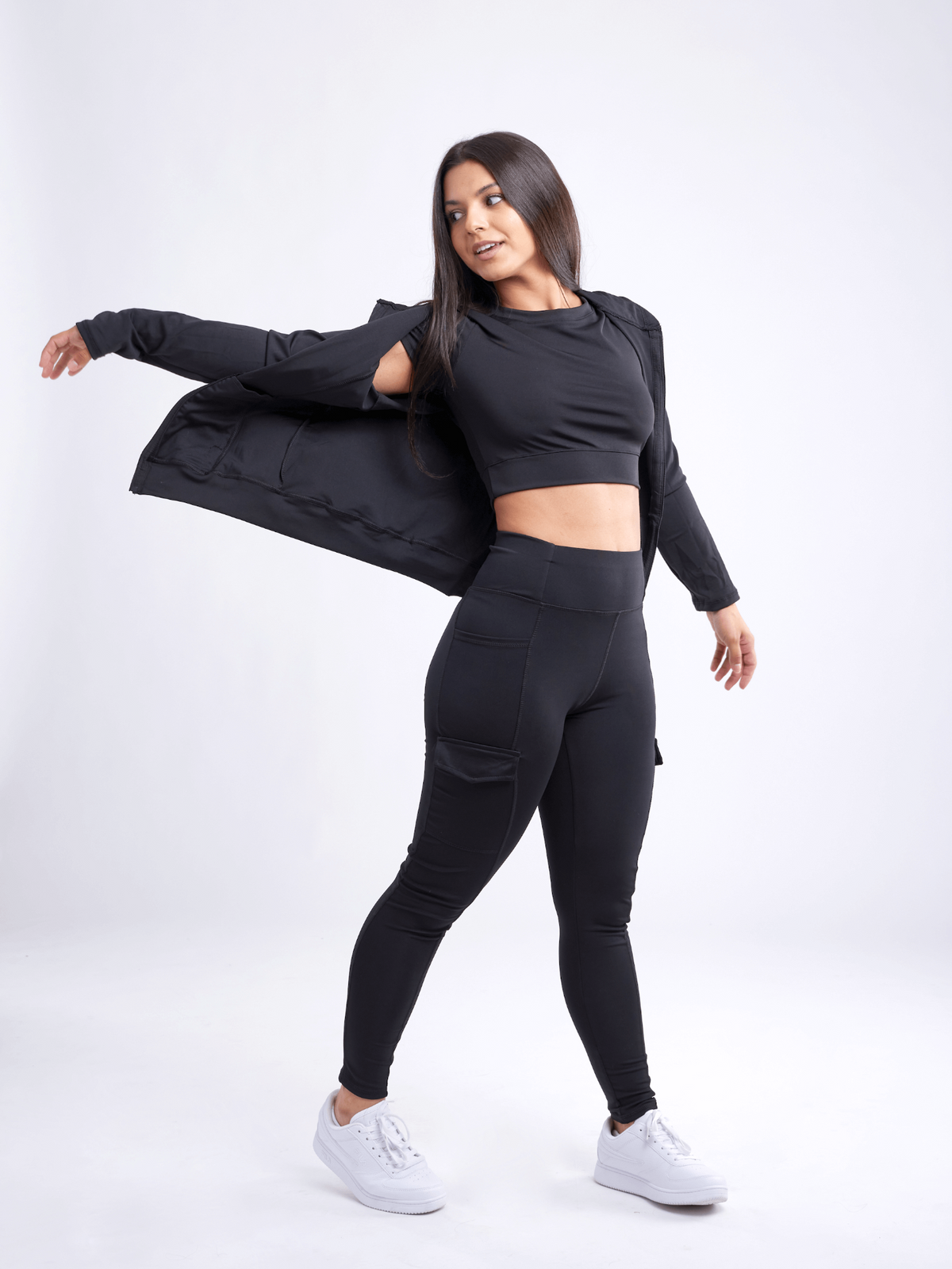 a woman in black outfit