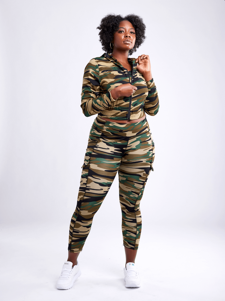 a woman in a camouflage outfit