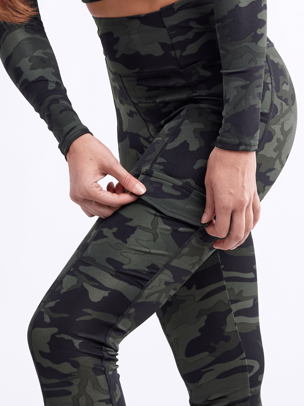 a person in a camouflage outfit