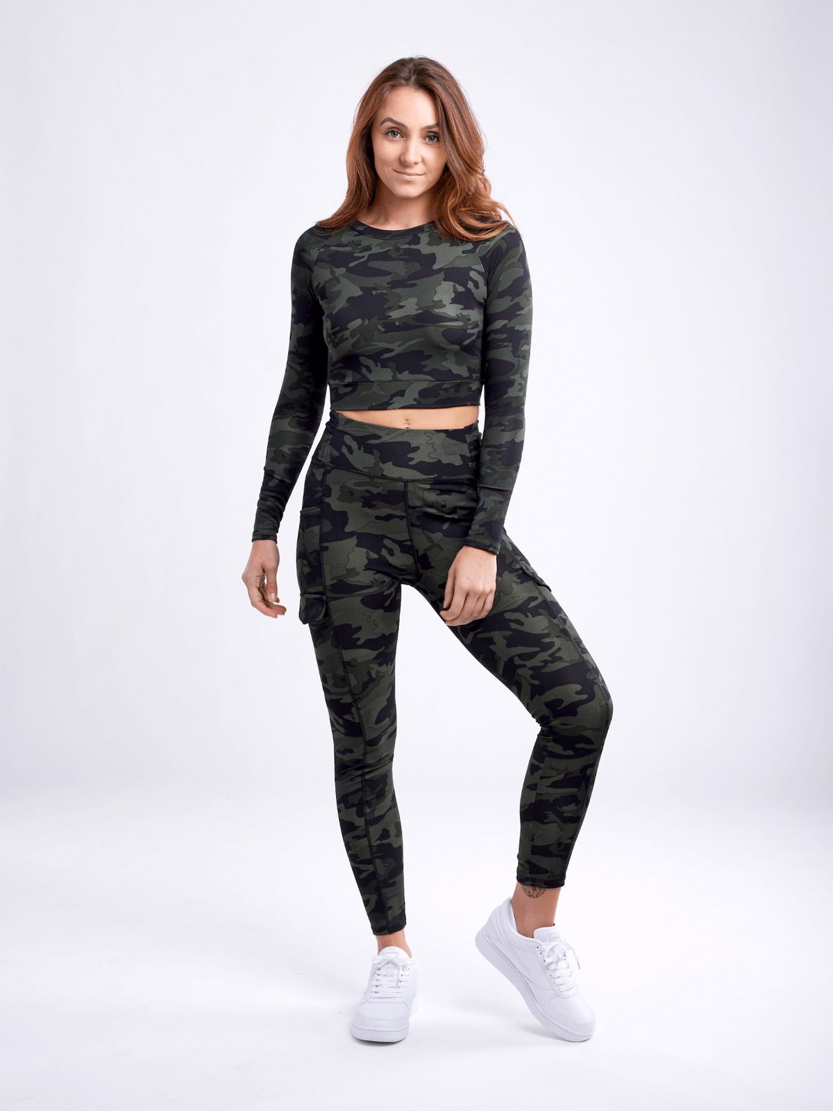 a woman in a camouflage outfit