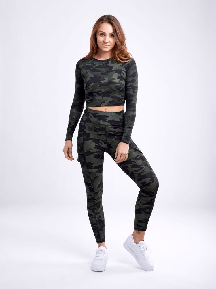 a woman in a camouflage outfit