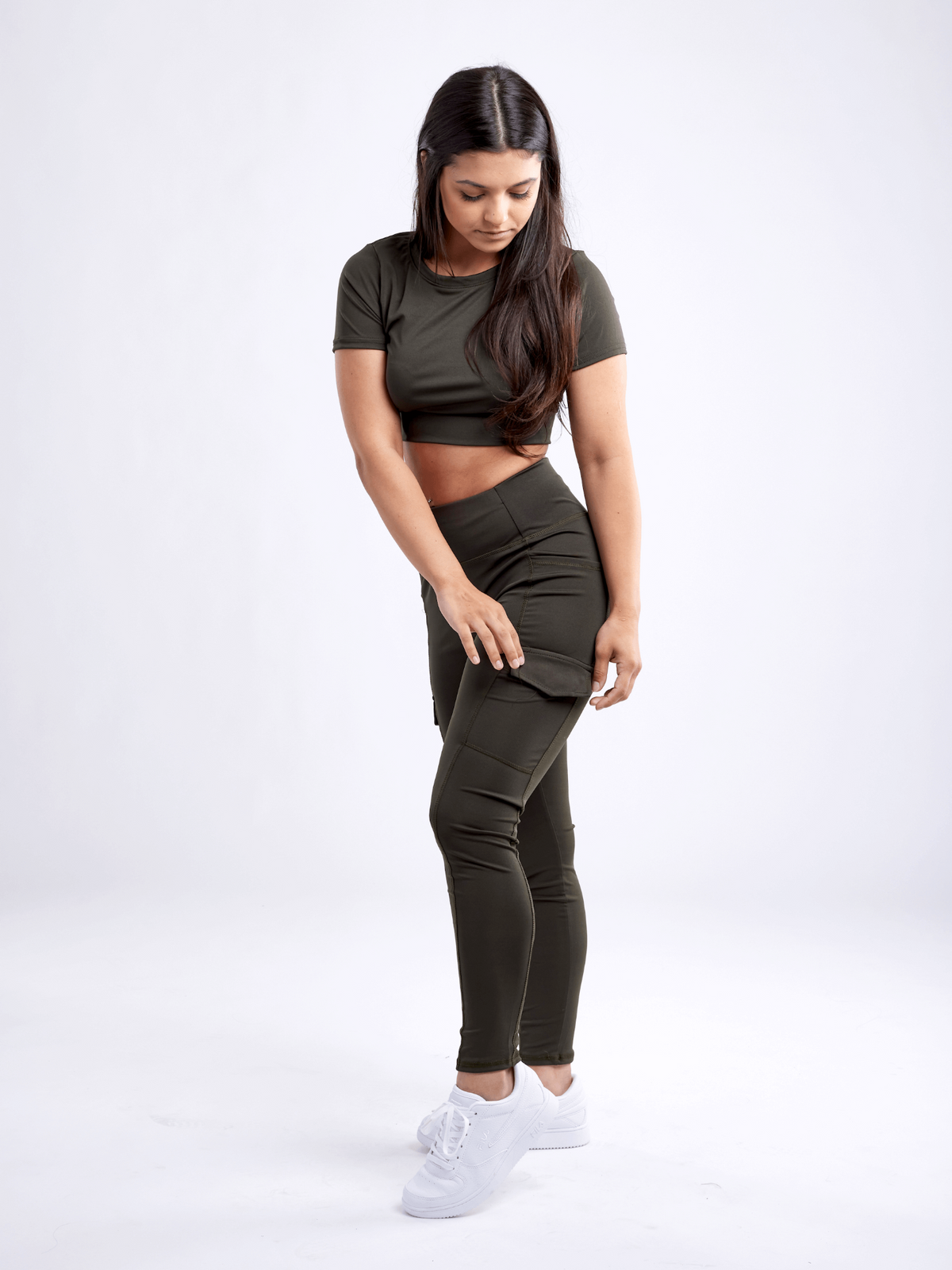 a woman in a black outfit
