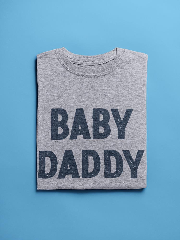 a folded grey shirt with black text on it