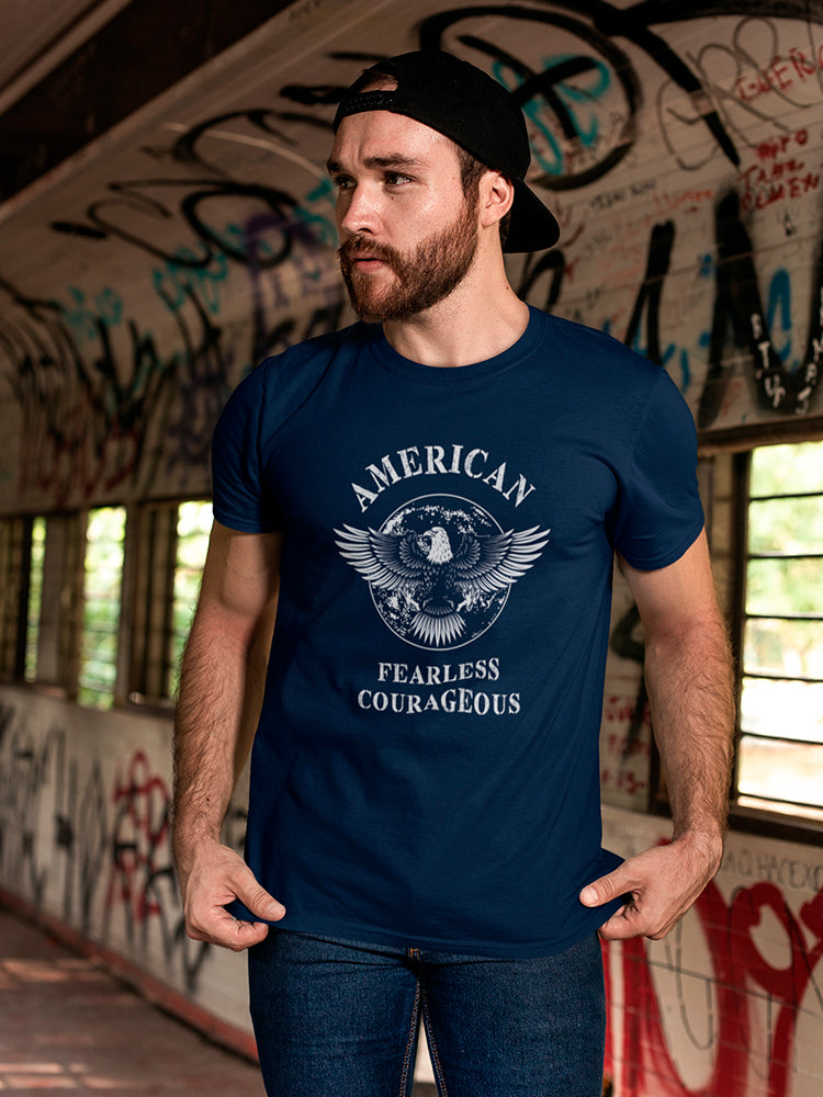 a man wearing a hat and a blue shirt