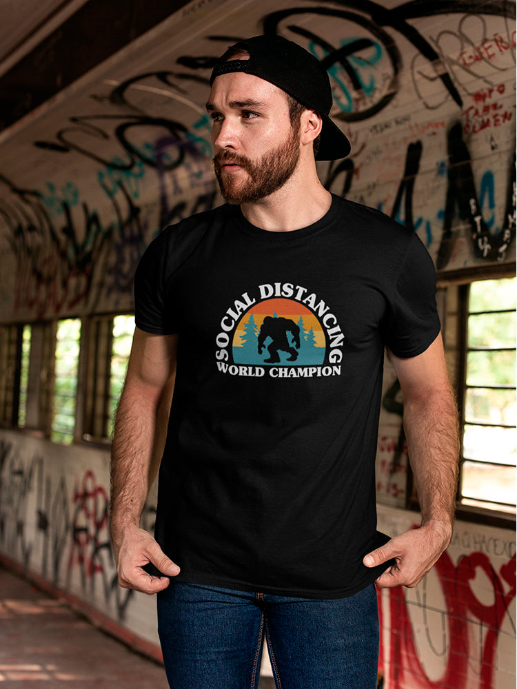 a man wearing a black hat and a black t-shirt