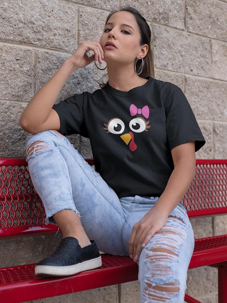 a woman sitting on a bench