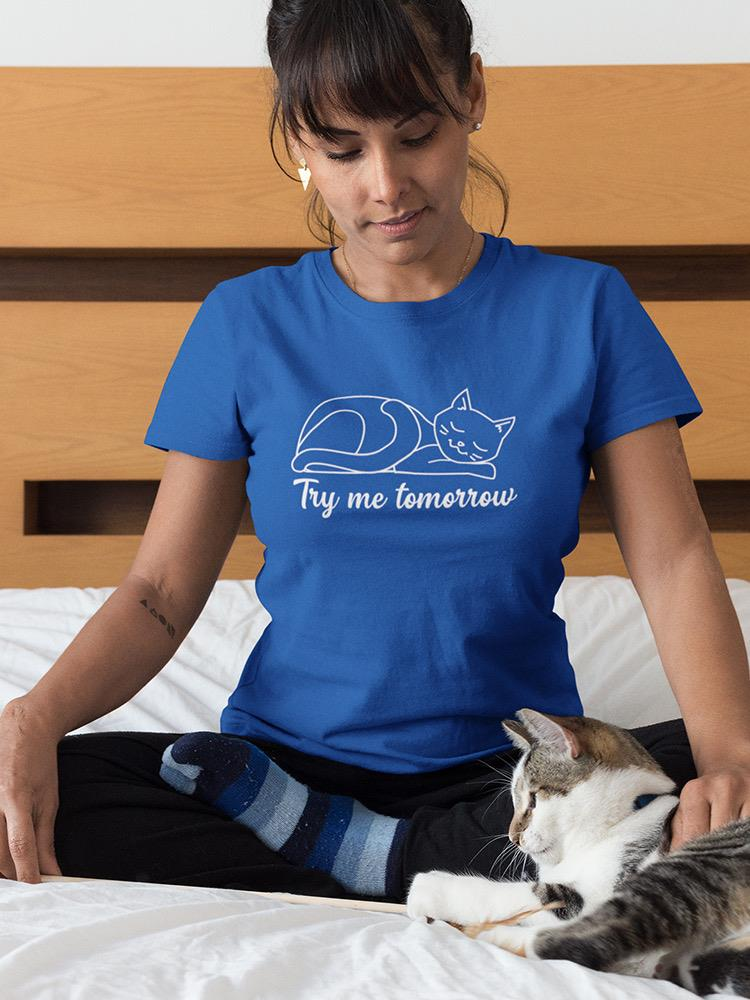 a woman sitting on a bed with a cat