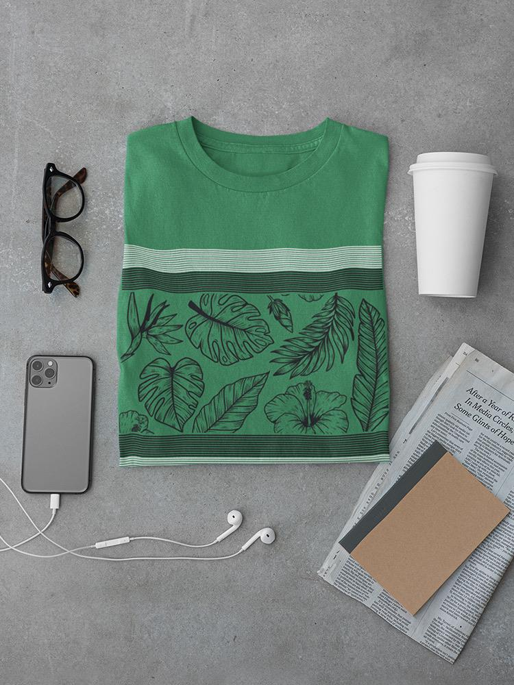 a green shirt with a green stripe and a green cup and a white phone and newspaper