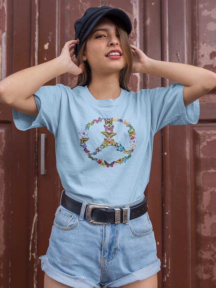 a woman wearing a hat and a blue shirt