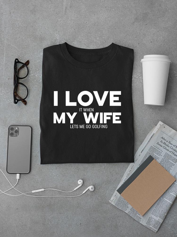 a black shirt with white text on it and a phone and glasses