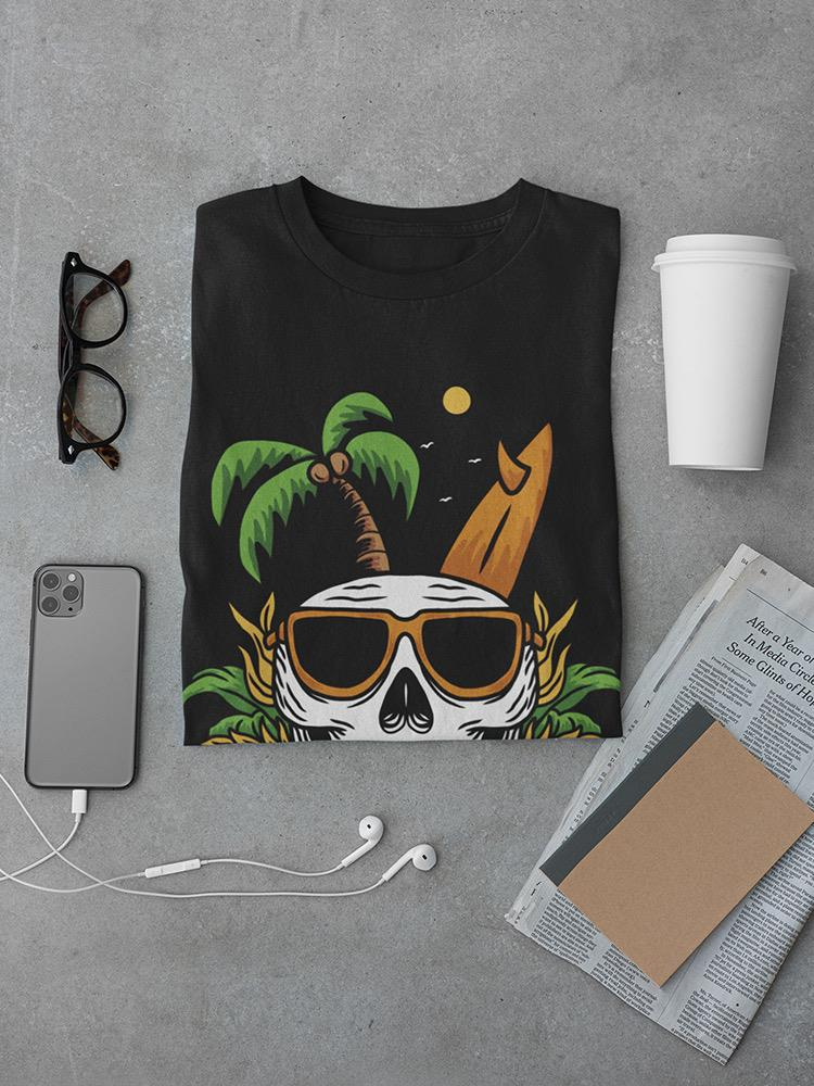 a shirt with a skull and sunglasses and a phone and newspaper