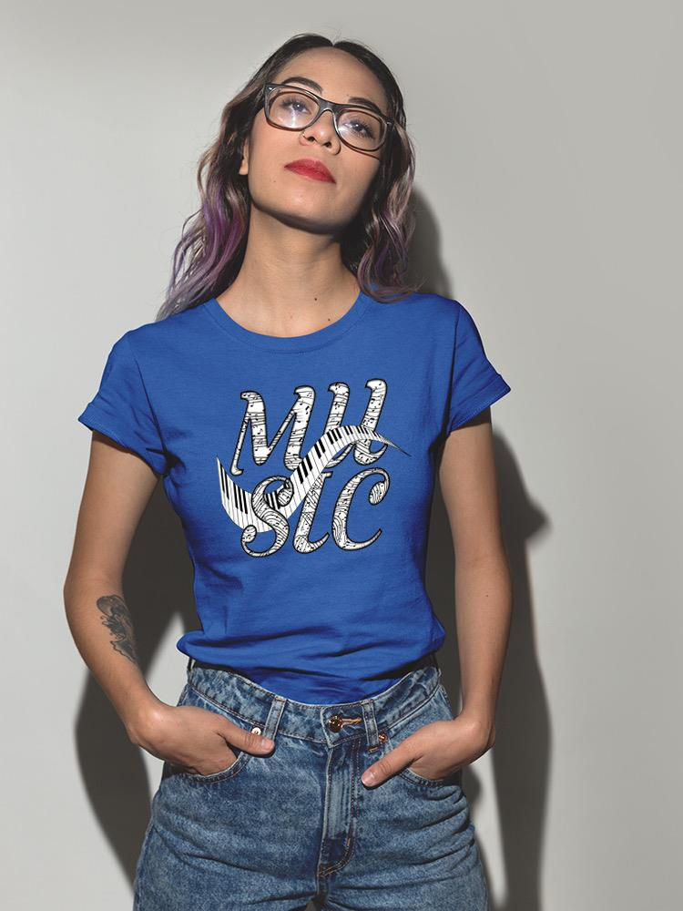a woman wearing glasses and a blue shirt