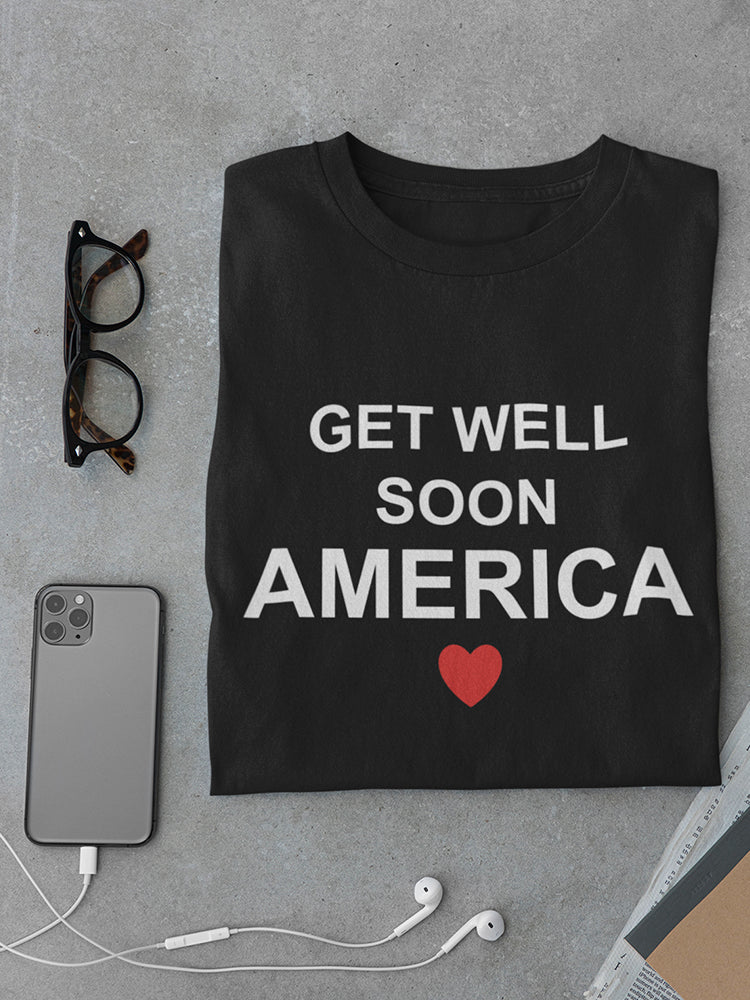 a black shirt with white text and a phone and glasses