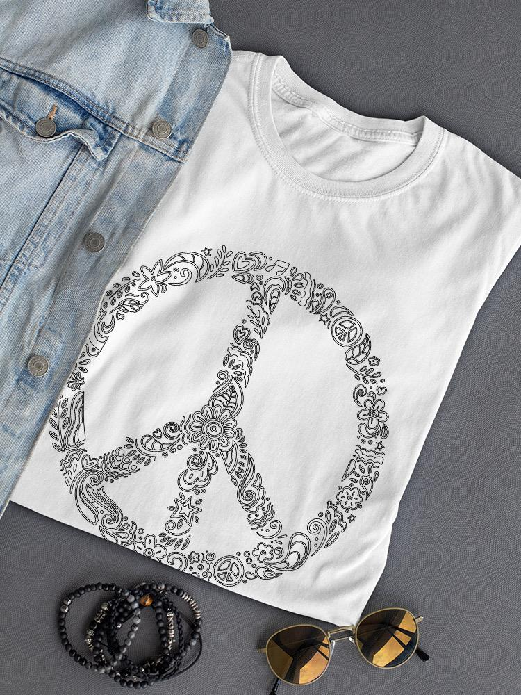 a white shirt with a peace sign on it