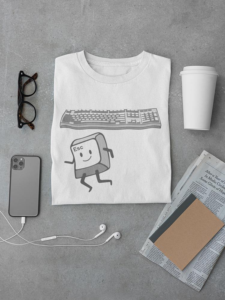a t-shirt with a cartoon on it and a phone and newspaper