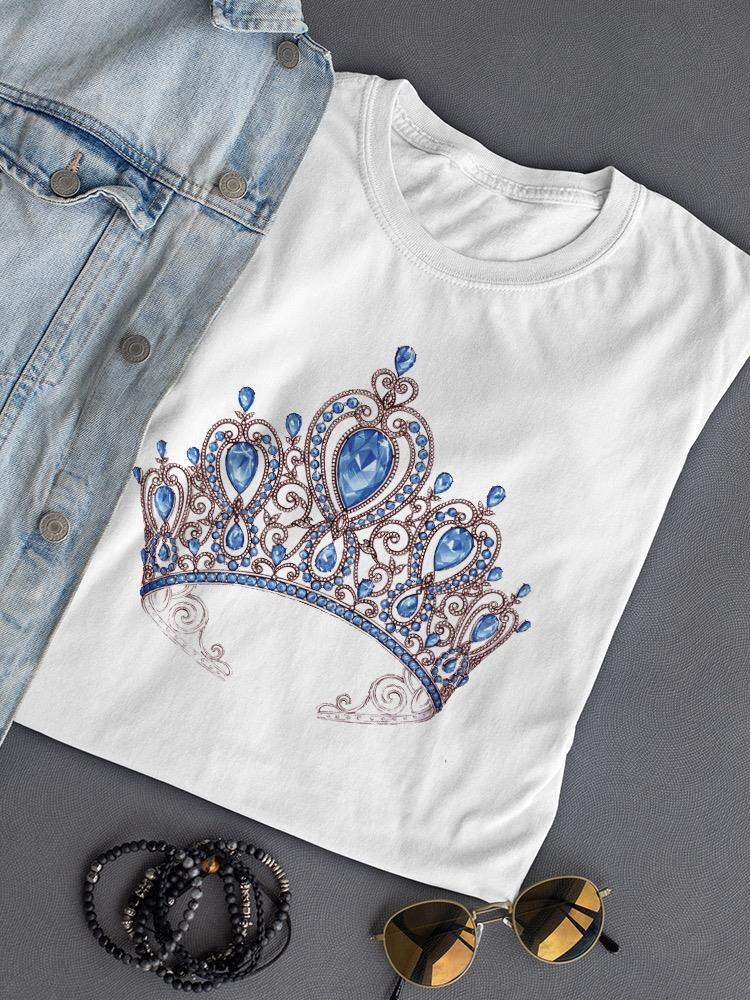 a white t-shirt with a crown on it and a denim jacket