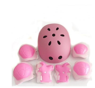a pink helmet with pads on it