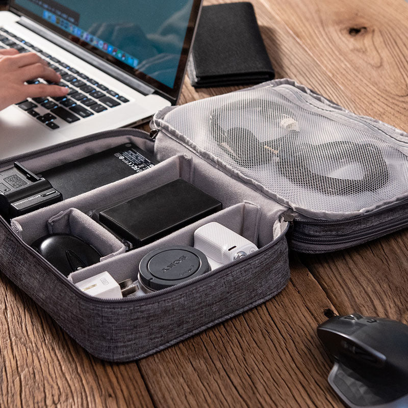 a laptop and a bag with electronics