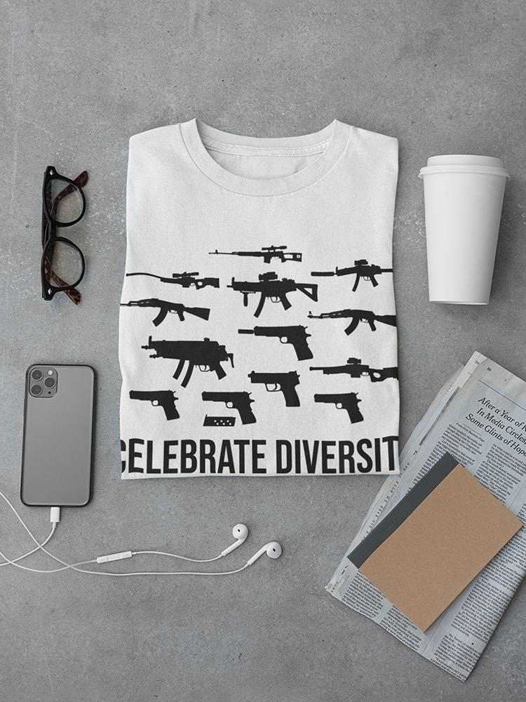 a shirt with guns and a phone and glasses