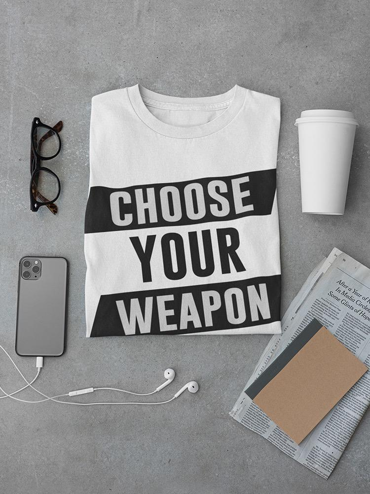 a shirt with a text on it and a phone and glasses