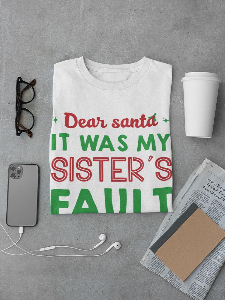 a shirt with a message on it and a phone and glasses