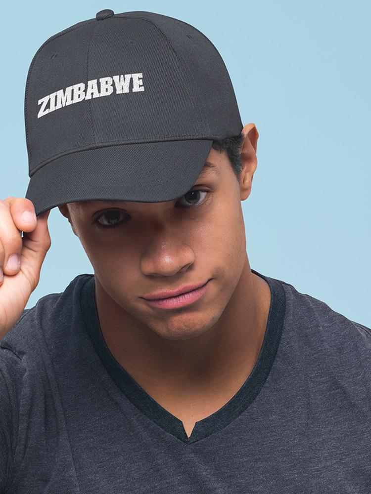 a man wearing a black hat