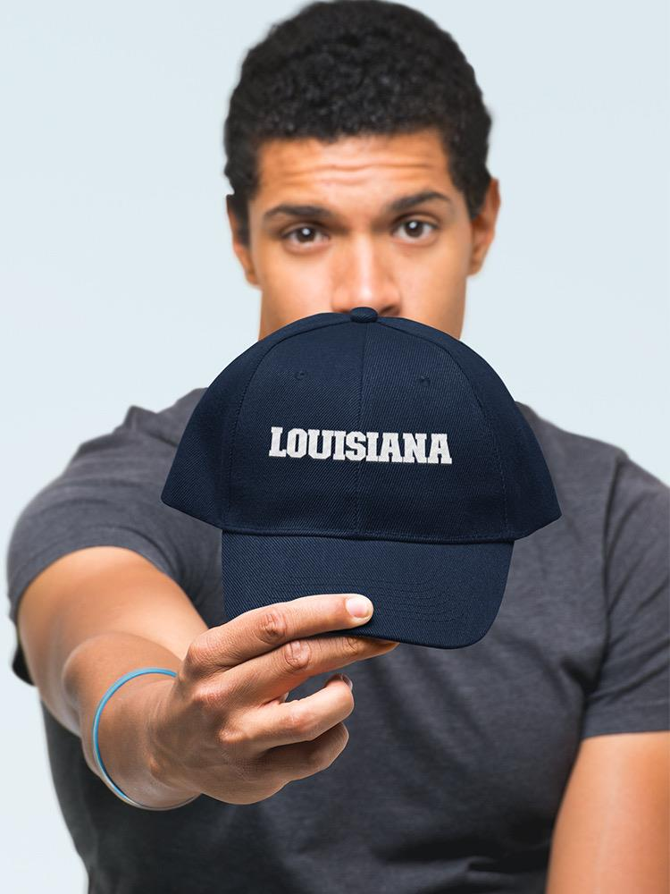 a man holding a hat