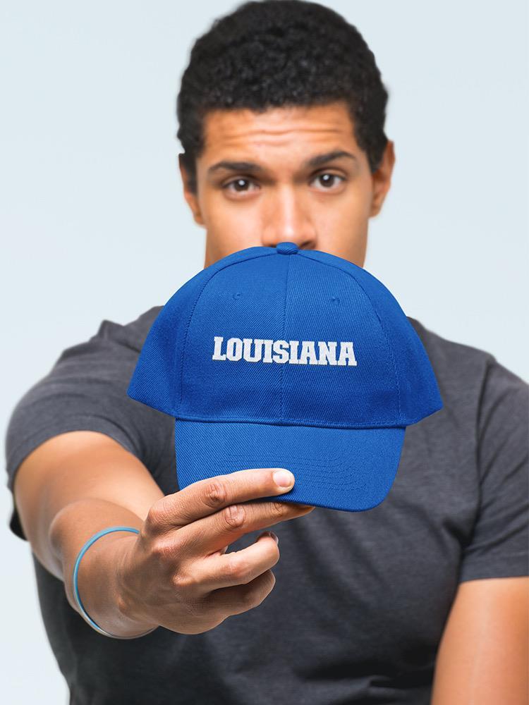 a man holding a blue hat