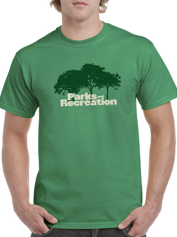 a man wearing a green shirt