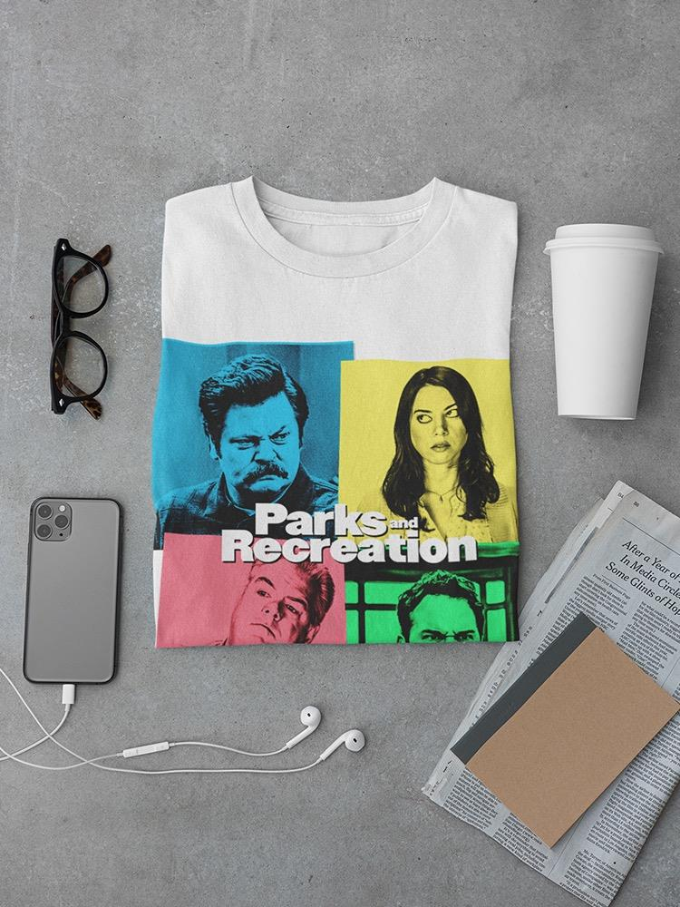 a shirt with a picture of people on it and a phone and newspaper