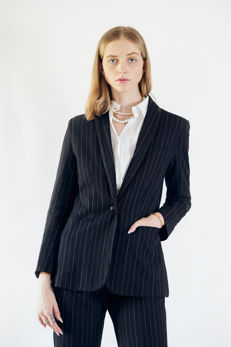 a woman in a suit