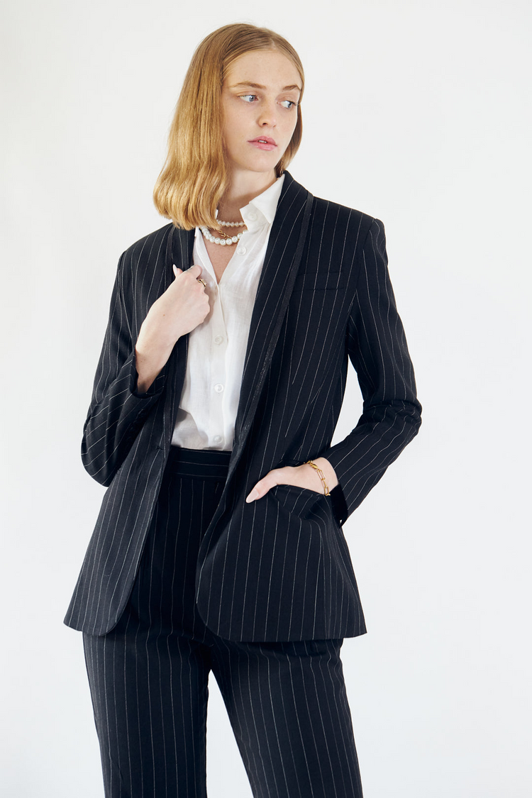 a woman in a suit