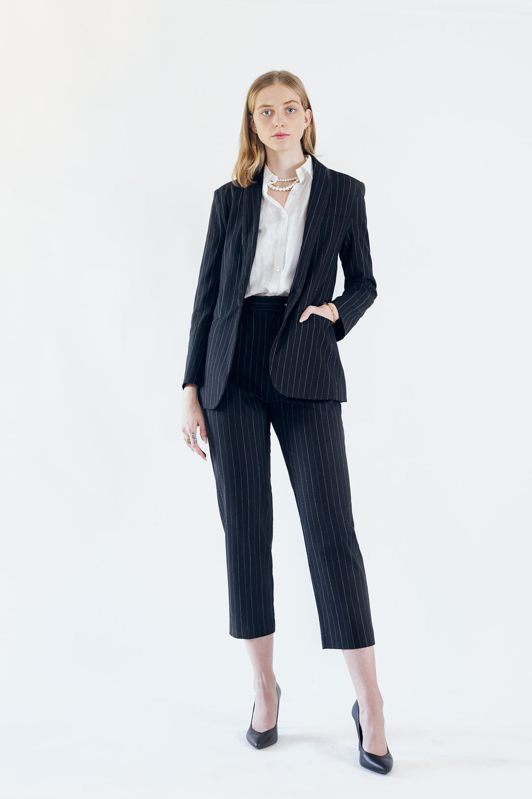 a woman in a suit