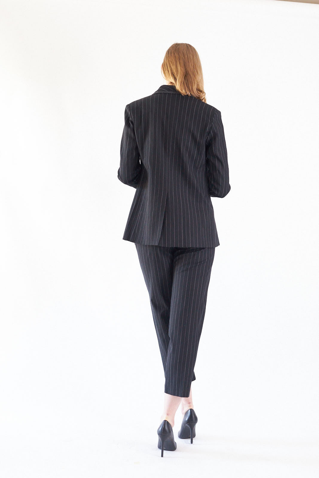 a woman in a suit