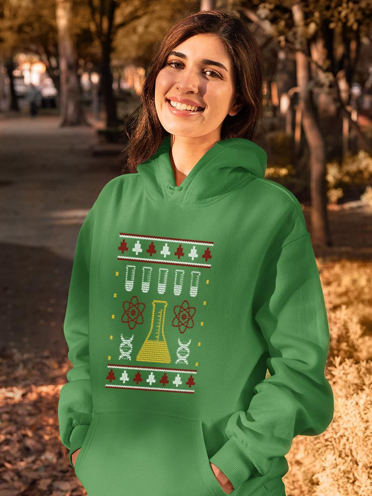 a woman in a green sweatshirt