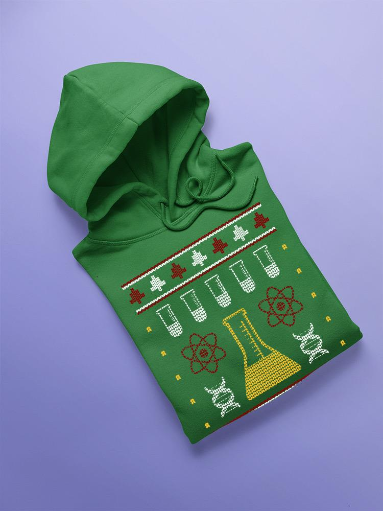 a green sweatshirt with a pattern on it